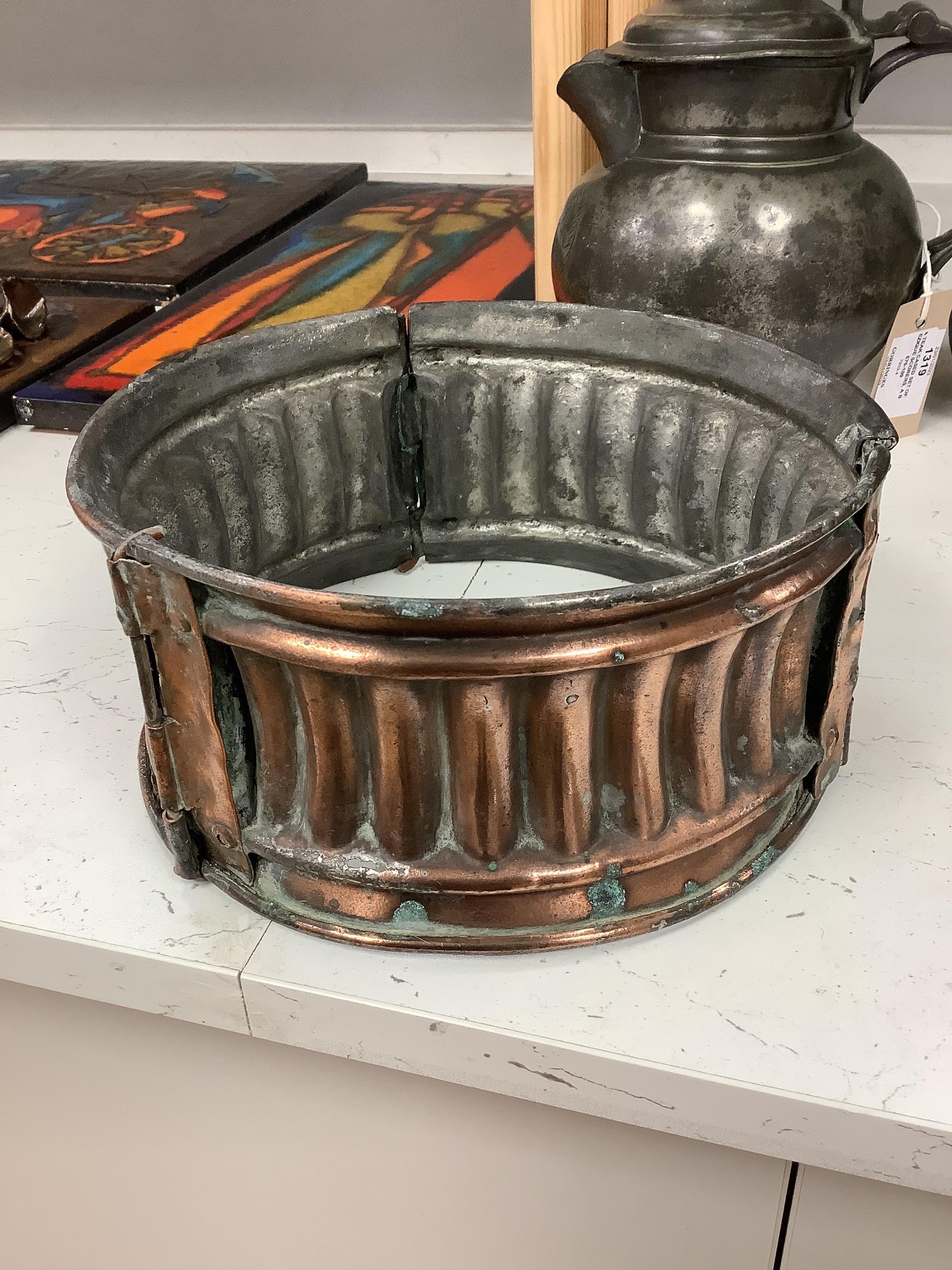 An unusual Victorian copper pie-mould, teak cased set of Bezique scorers, a brass link chain, a 19th century pewter pitcher, an Art Nouveau oil lamp, and two other items